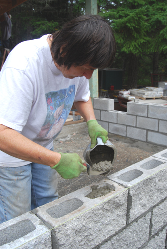 Dianne pours cement